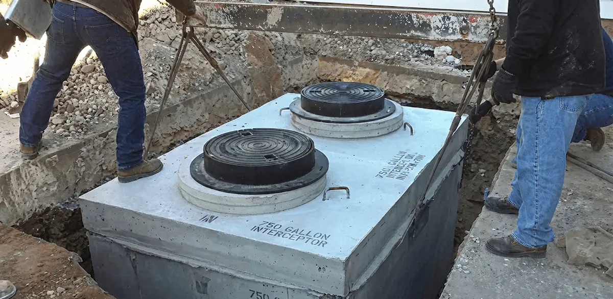 Grease trap installation for a commercial property drainage system in Fort Collins, CO